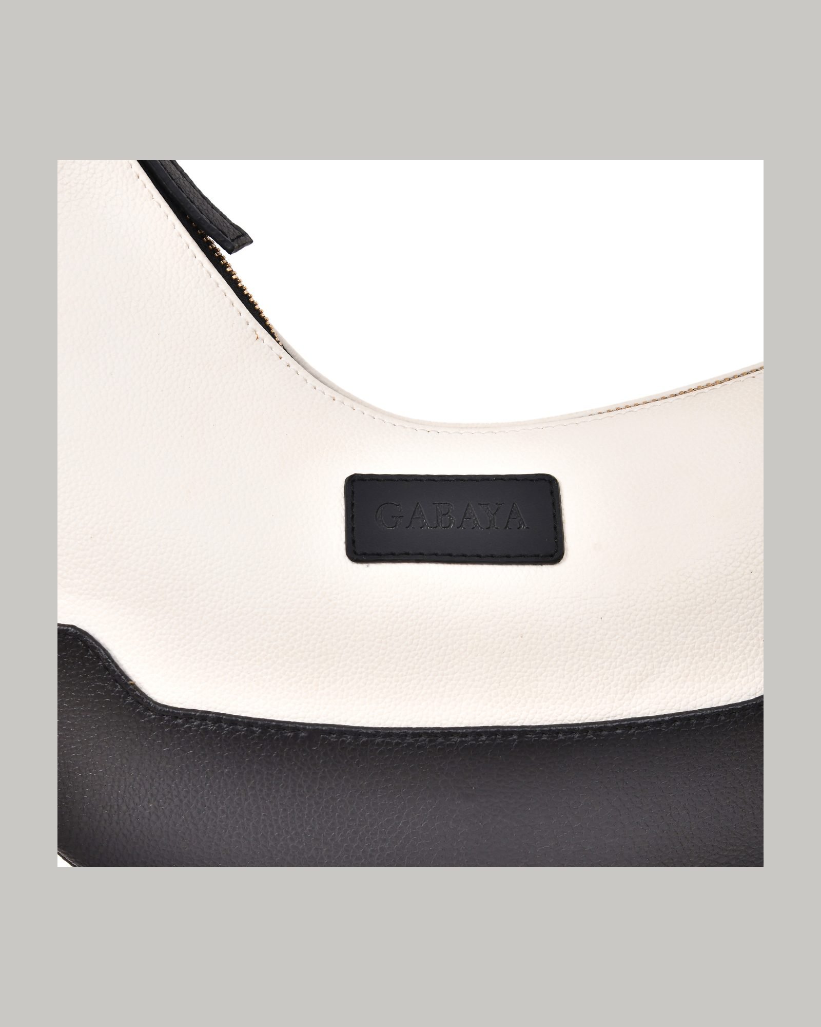 Two Tone Crescent Shoulder Bag in White/Black - three-quarter view